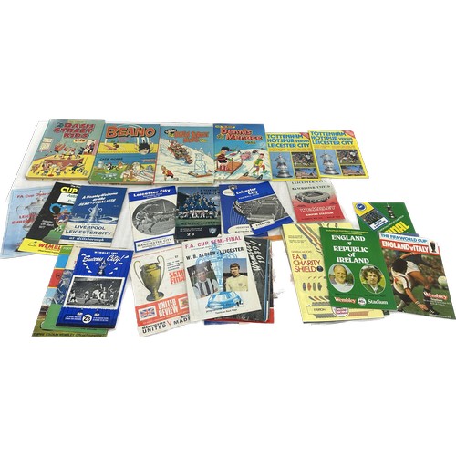 157 - Selection of vintage football programmes various dates and teams, a long with a selection of hard ba... 