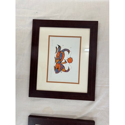 8 - Pair of framed prints by Norval Morrisseau 15 inches by 12 inches