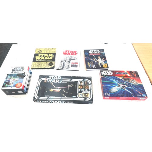 143 - Selection of Star wars items includes Books, Battle ships etc