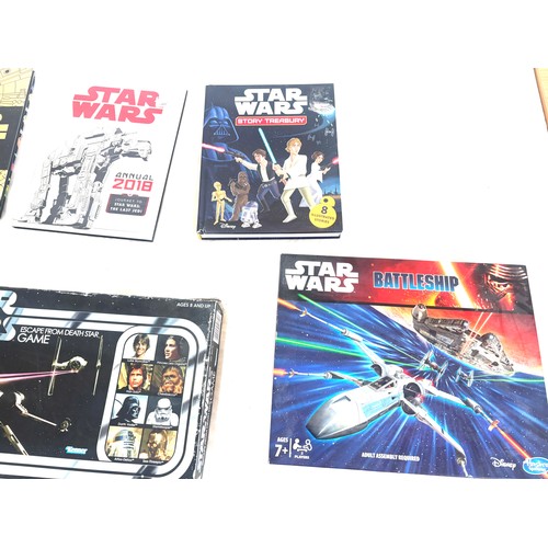 143 - Selection of Star wars items includes Books, Battle ships etc