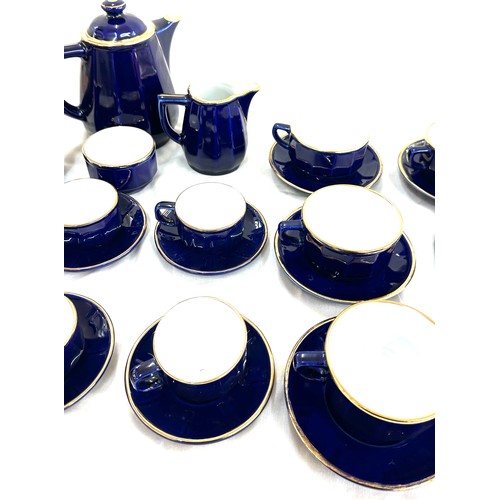 131 - Blue and Gold 6 piece tea set, complete with tea pot, a long with blue and gold 6 piece coffee cups ... 