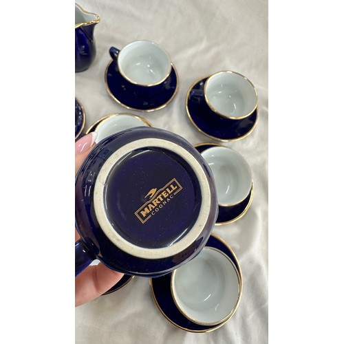 131 - Blue and Gold 6 piece tea set, complete with tea pot, a long with blue and gold 6 piece coffee cups ... 