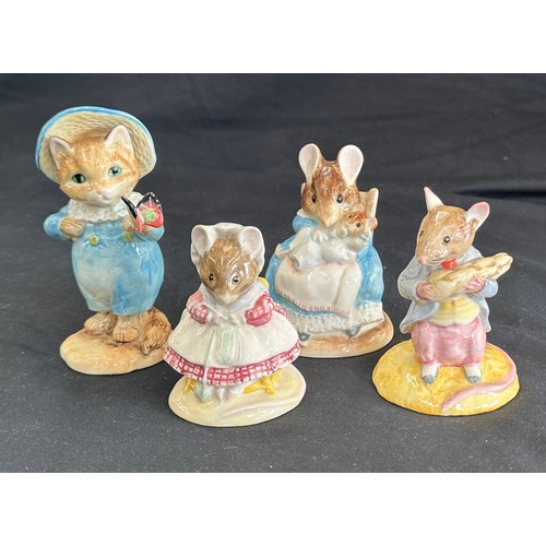 87 - Four vintage Beatrix Potter figures to include ' Hunca Munca and Baby', ' The Old Woman who lived in... 