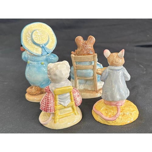 87 - Four vintage Beatrix Potter figures to include ' Hunca Munca and Baby', ' The Old Woman who lived in... 