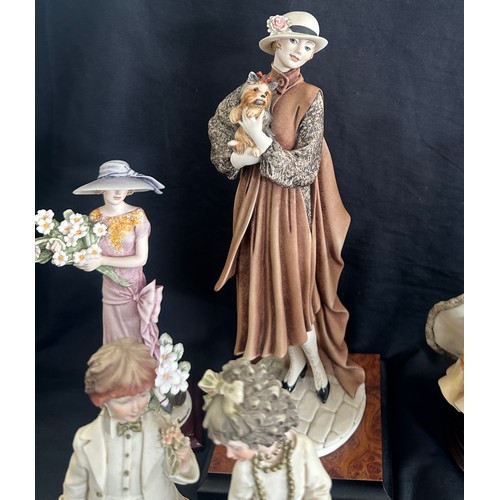 59 - Selection of vintage lady, children and animal figurines tallest measures approximately 13 inches ta... 