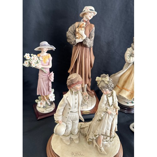 59 - Selection of vintage lady, children and animal figurines tallest measures approximately 13 inches ta... 