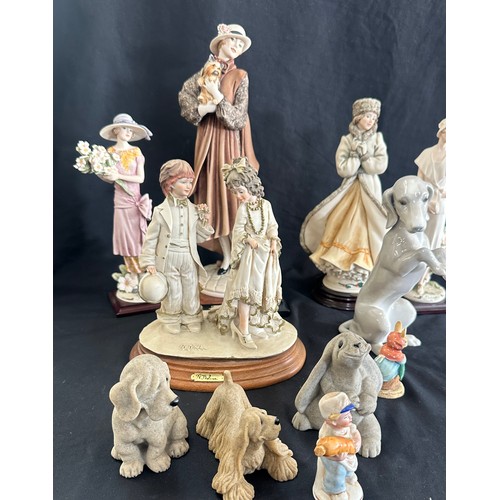 59 - Selection of vintage lady, children and animal figurines tallest measures approximately 13 inches ta... 