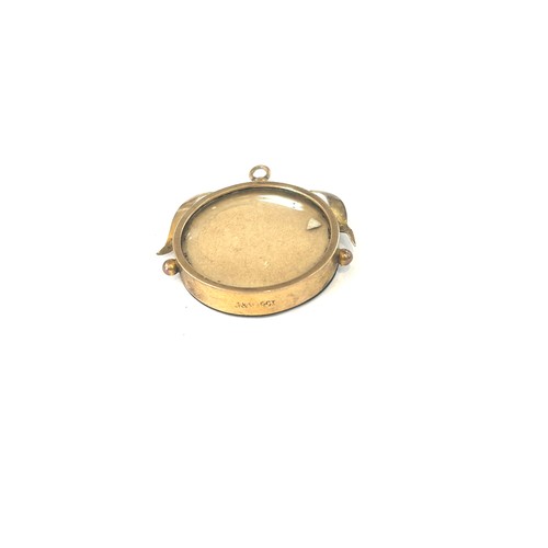 451 - 9ct gold open face locket pendant, total weight 3 grams