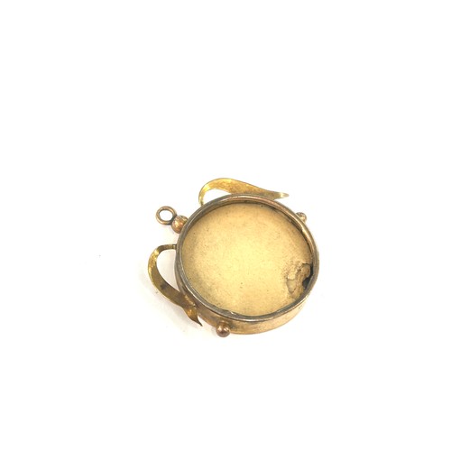 451 - 9ct gold open face locket pendant, total weight 3 grams