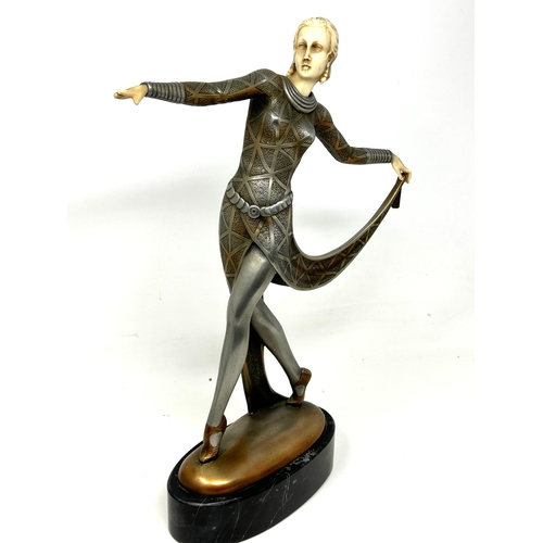 13 - Art deco dancer in the style of lorenzl ,cold cast ,pewter finish Ivorine measures approx height 30c... 