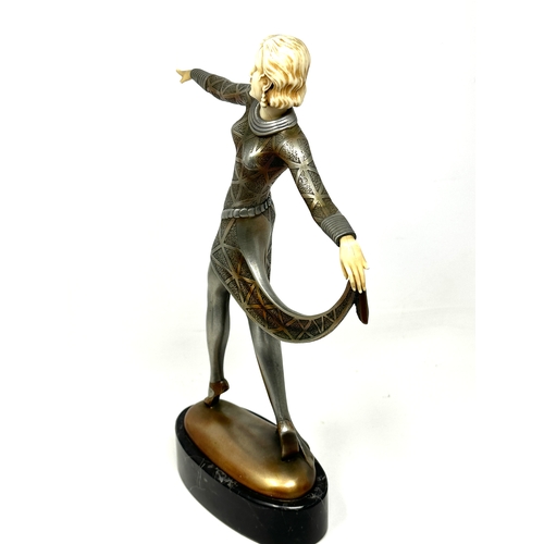 13 - Art deco dancer in the style of lorenzl ,cold cast ,pewter finish Ivorine measures approx height 30c... 