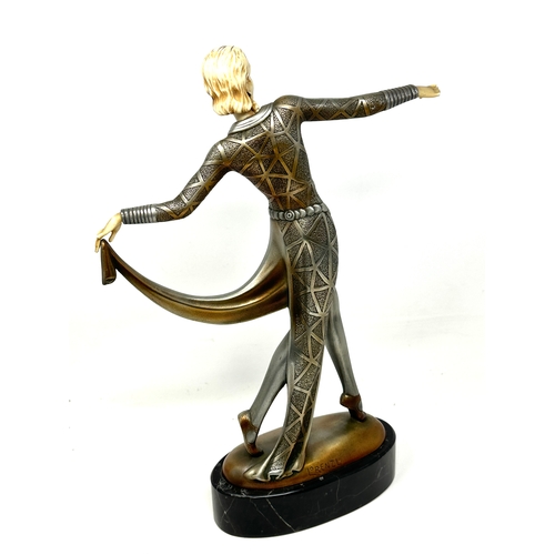 13 - Art deco dancer in the style of lorenzl ,cold cast ,pewter finish Ivorine measures approx height 30c... 