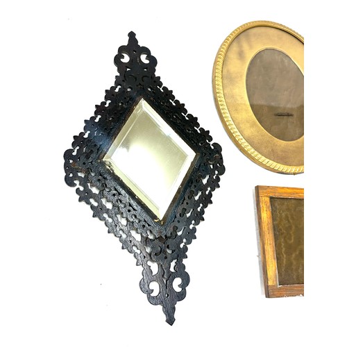 211 - Selection of assorted framed includes Tramp art framed mirror measures approximately 12 inches tall