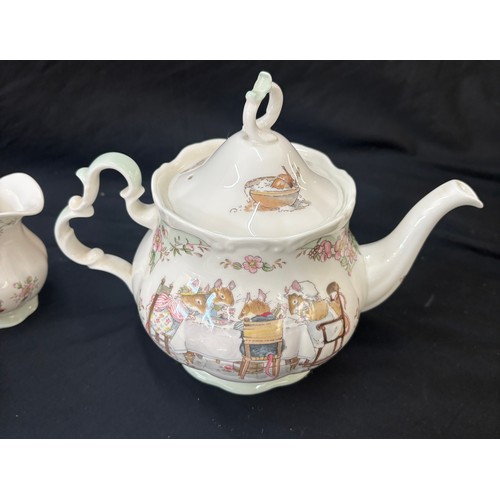 155 - Royal Doulton Bramley Hedge tea service comprising of teapot, milk jug, sugar bowl, tray