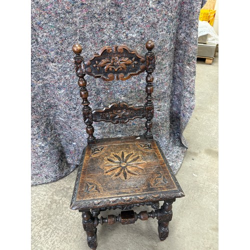 241 - Antique heavily carved chair