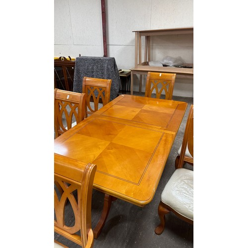 290 - Extending modern inlaid twin pedastool table and six chairs, table measures without leaf  62 inches ... 