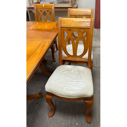 290 - Extending modern inlaid twin pedastool table and six chairs, table measures without leaf  62 inches ... 