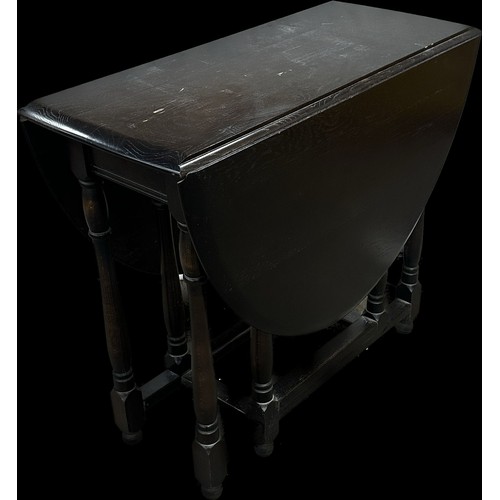 267 - Possibly Ercol gate leg table measures approximately 34 inches wide by 16 deep and 29 tall