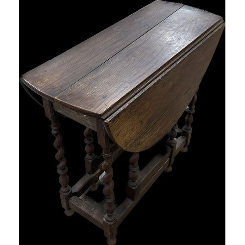 243 - Antique oak gate leg table measures approx 28 inches tall x 31 long and 14 deep
