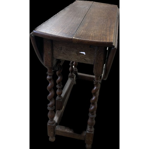 243 - Antique oak gate leg table measures approx 28 inches tall x 31 long and 14 deep