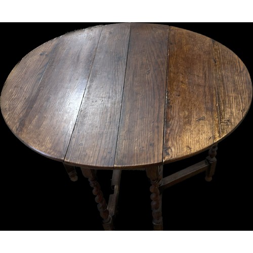 243 - Antique oak gate leg table measures approx 28 inches tall x 31 long and 14 deep