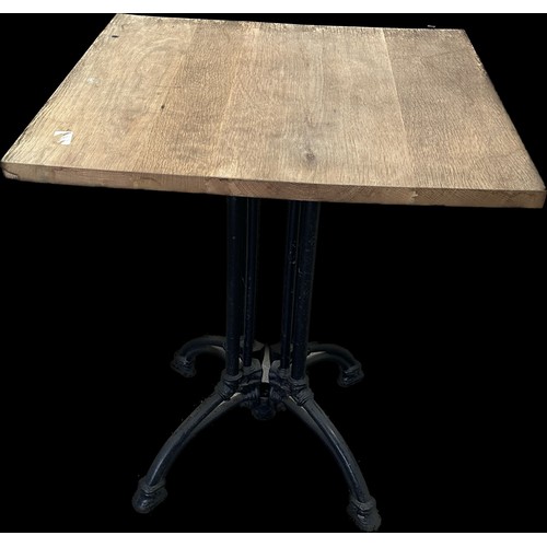 287 - Cast iron pub table measures approximately 28 inches tall x 24 wide and 24 deep