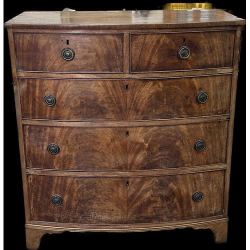 261 - Antique two over three flamed magohany bow fronted chest measures approximately 40 inches tall x 36 ... 