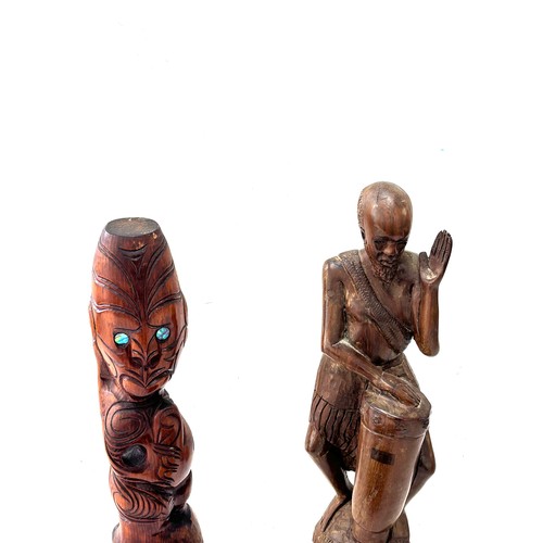 193 - Selection of carved African figures tallest measures 15.5 inches tall