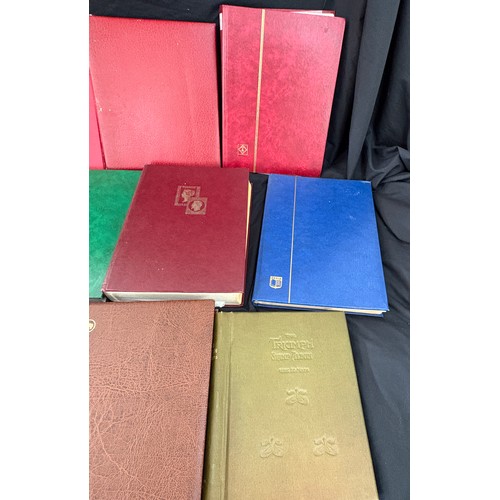 117 - 11 stamp albums with various assorted vintage and later stamps