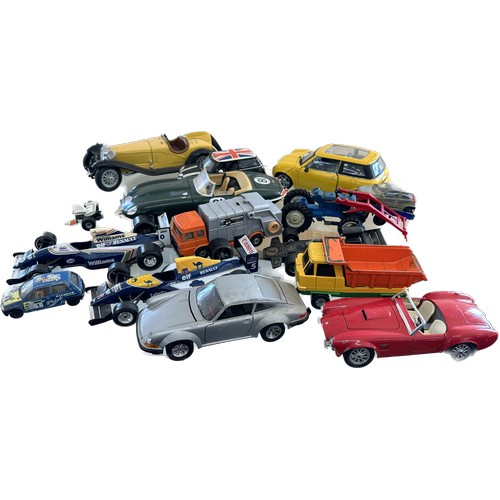 148 - Large selection of vintage and later vehicles to include Burago, Corgi etc