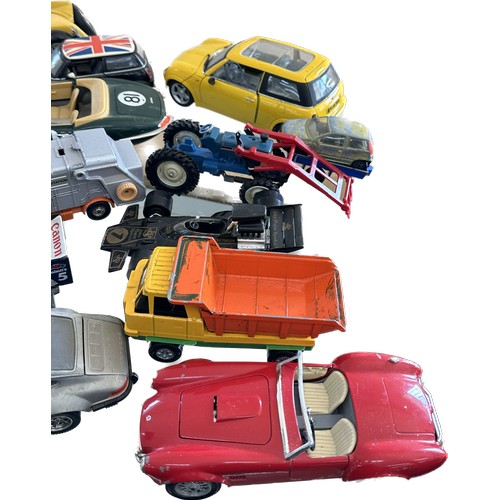 148 - Large selection of vintage and later vehicles to include Burago, Corgi etc