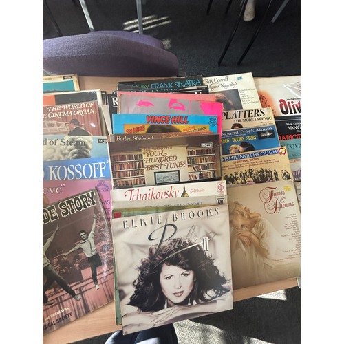 187 - Large selection of assorted records includes John Lennon etc