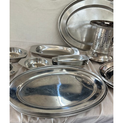 180 - Selection of metalware items to include stainless steel meat trays, a metal fondue stove etc