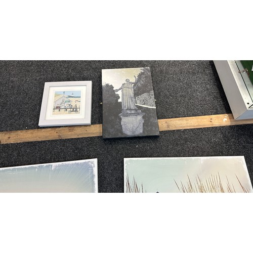 121 - Selection of three canvas art work depicting sandy beach scenes etc and one picture largest measures... 