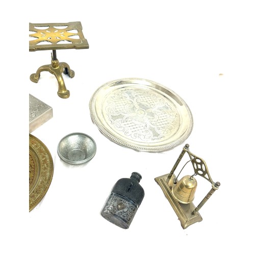 131 - Selection of brass and plated ware to include trays, bell etc
