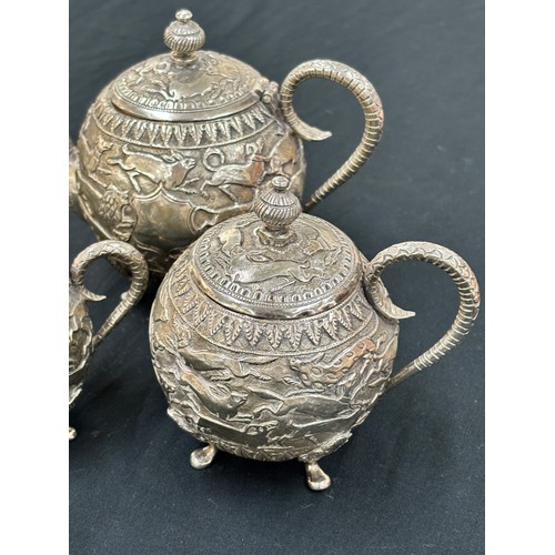 302 - Fine Thai 800 grade silver three piece tea service, no marks, consists of a tea Pot, lidded sugar po... 