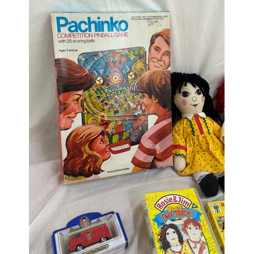 144 - Selection of vintage toys and games to include Rosie and Jim dolls, jigsaw puzzles and videos, along... 