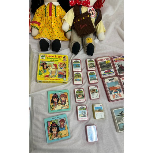 144 - Selection of vintage toys and games to include Rosie and Jim dolls, jigsaw puzzles and videos, along... 