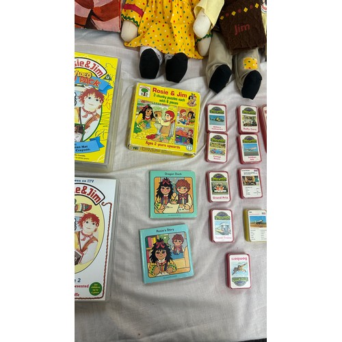 144 - Selection of vintage toys and games to include Rosie and Jim dolls, jigsaw puzzles and videos, along... 