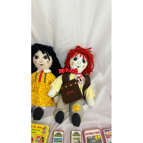 144 - Selection of vintage toys and games to include Rosie and Jim dolls, jigsaw puzzles and videos, along... 