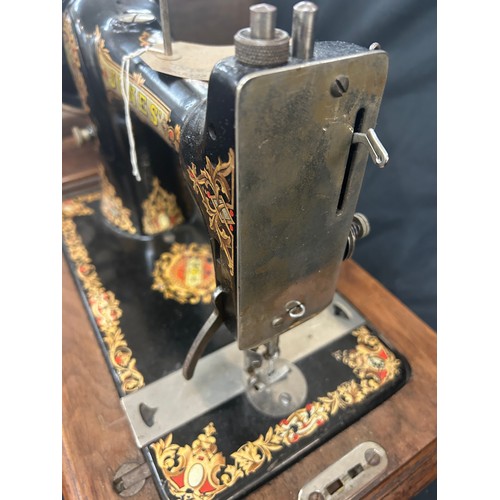 109 - Vintage Jones cased sewing machine
