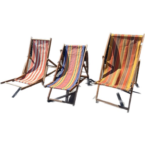 275 - Three vintage folding deck chairs