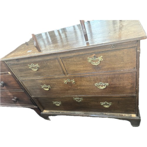 249 - Antique two over two oak chest with brush slide and key  measures approximately 32 inches tall x 40 ... 