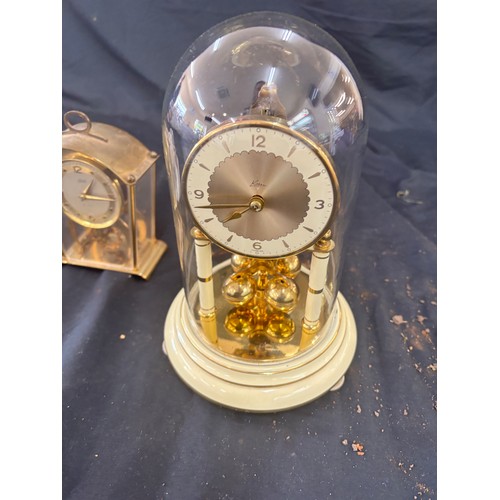 33 - Three assorted clocks includes carriage etc, untested