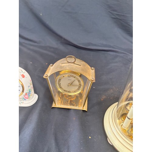 33 - Three assorted clocks includes carriage etc, untested