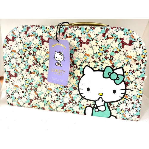 Vintage Hello Kitty Liberty Art Fabrics tea cup set in carry case