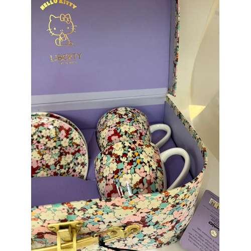 Vintage Hello Kitty Liberty Art Fabrics tea cup set in carry case