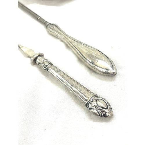 Vintage silver handles button hook and spoon along with a silver plated ...