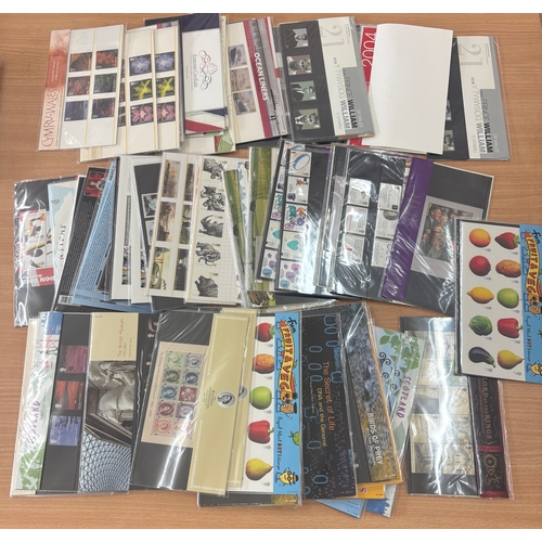 Large selection of sealed stamp presentation packs