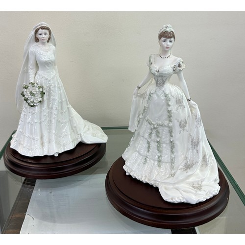 585 - Two Coalport lady bride figurines ' The Queen' and ' Queen Mary' both on wooden plinths, approximate... 
